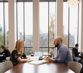 Students Stephanie Lewis and Zachary al-Khatib work together at the Bora Laskin Law Library