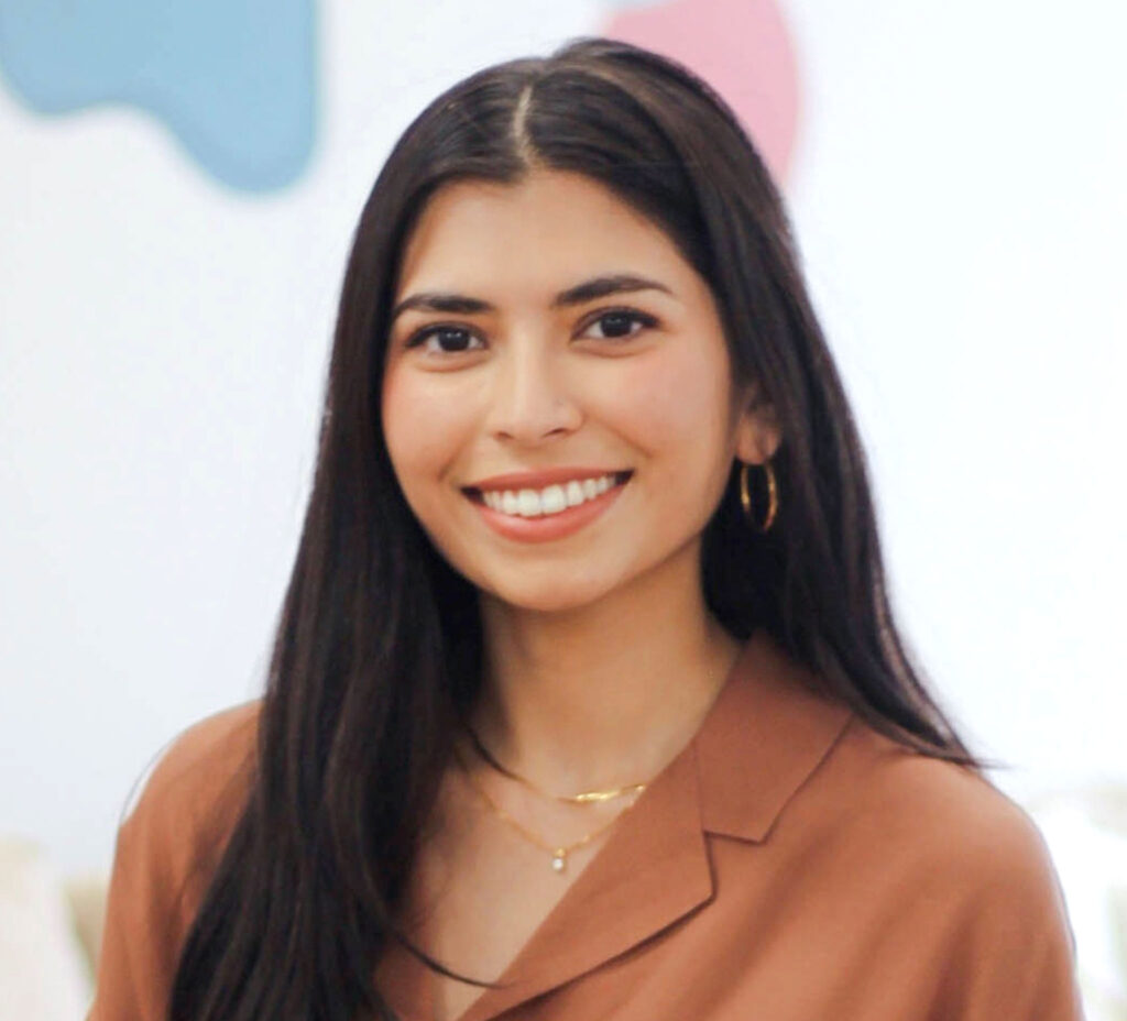 Headshot of Nuha Siddiqui smiling