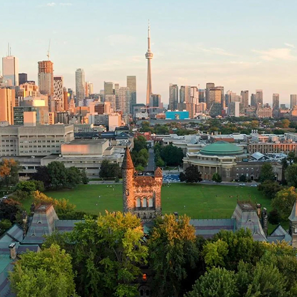 The CN Tower can be seen in a Toronto city scape.